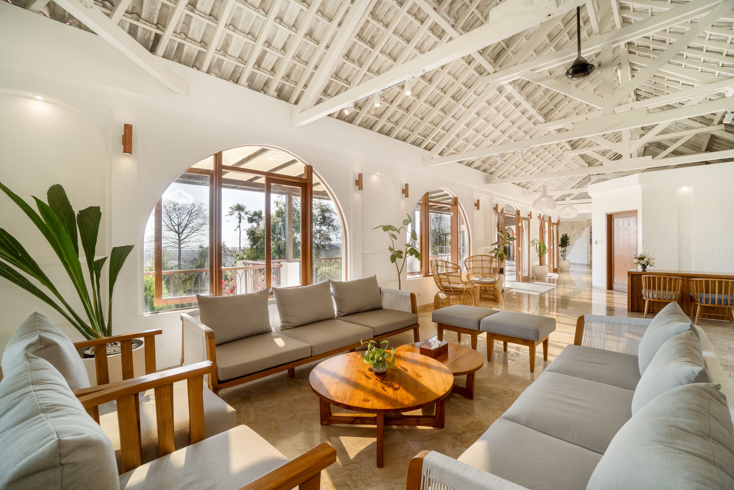 Lounge under the white timber roof of the main building